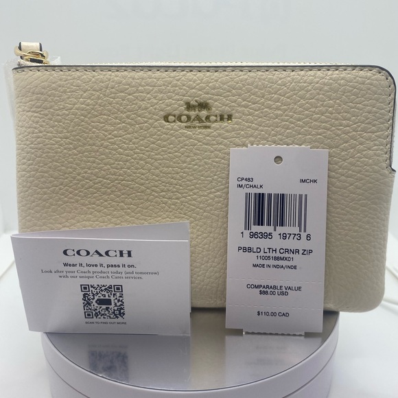 Coach Cream Leather Clutch with Zipper Closure
